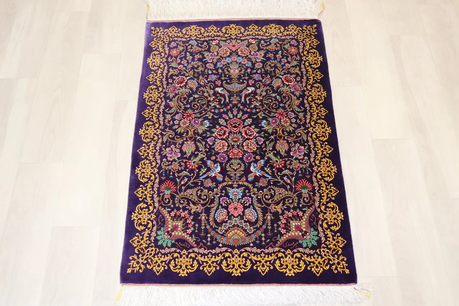 Persian carpet, 100% silk from Qom, Mirmehidi Atelier, flowers on a deep purple background
