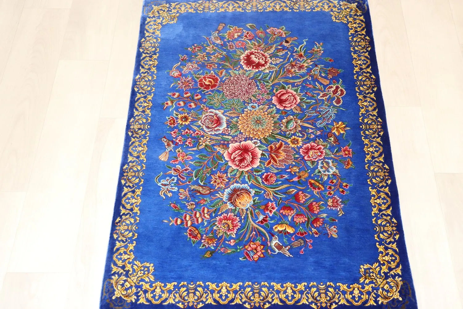 Persian carpet, 100% silk from Qom, Mirmekhidi Atelier, elegant bouquet pattern blooming in sky blue