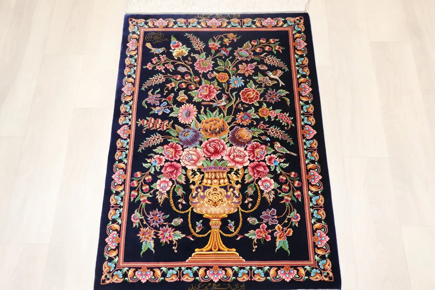 Persian carpet from Qom, 100% silk, Mirmekhidi Atelier, navy blue with a vase pattern and elegant colors