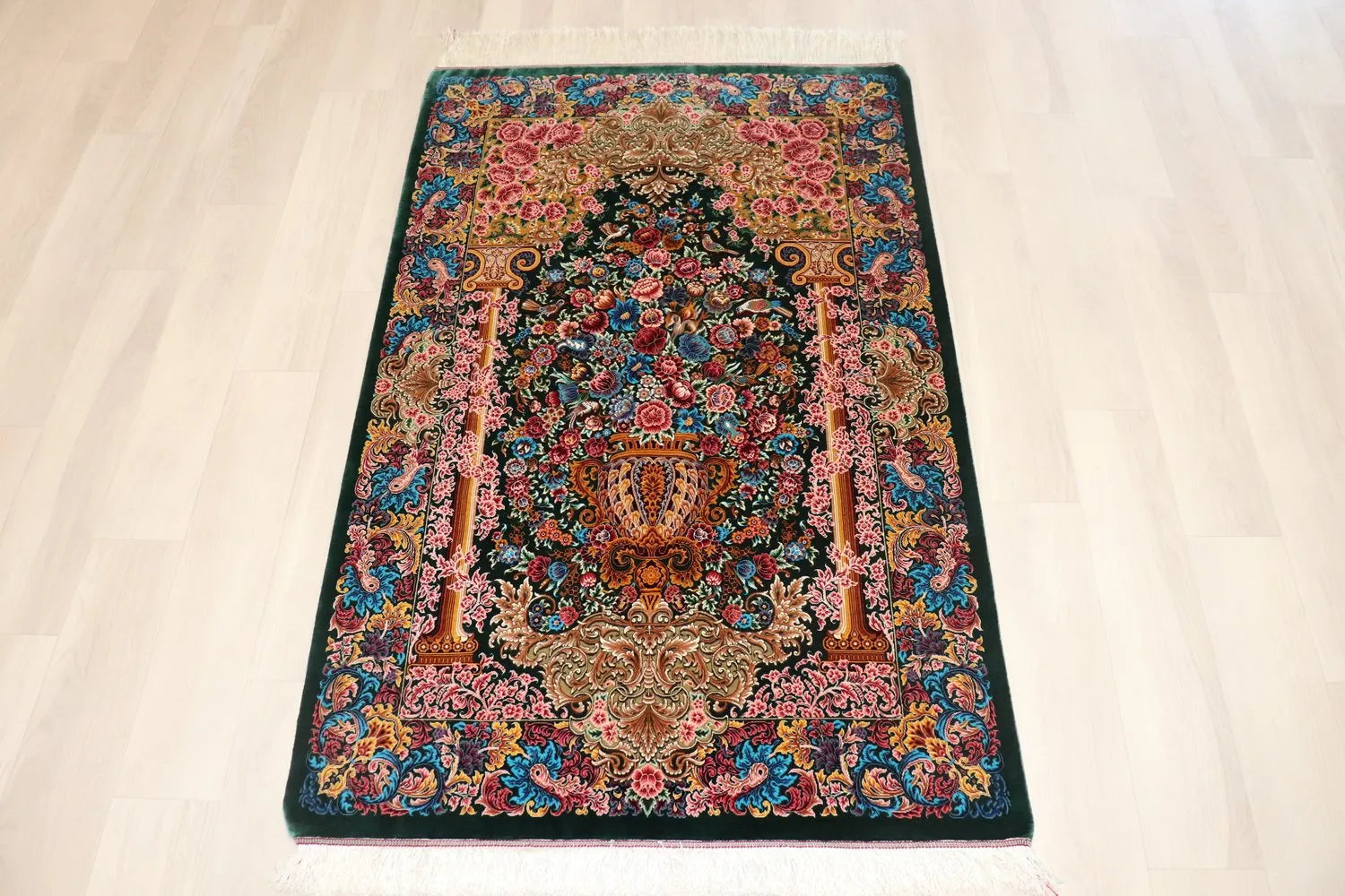 Persian carpet, 100% silk from Qom, Mirmekhidi Atelier, a vase pattern with gorgeous deep green and pink colors