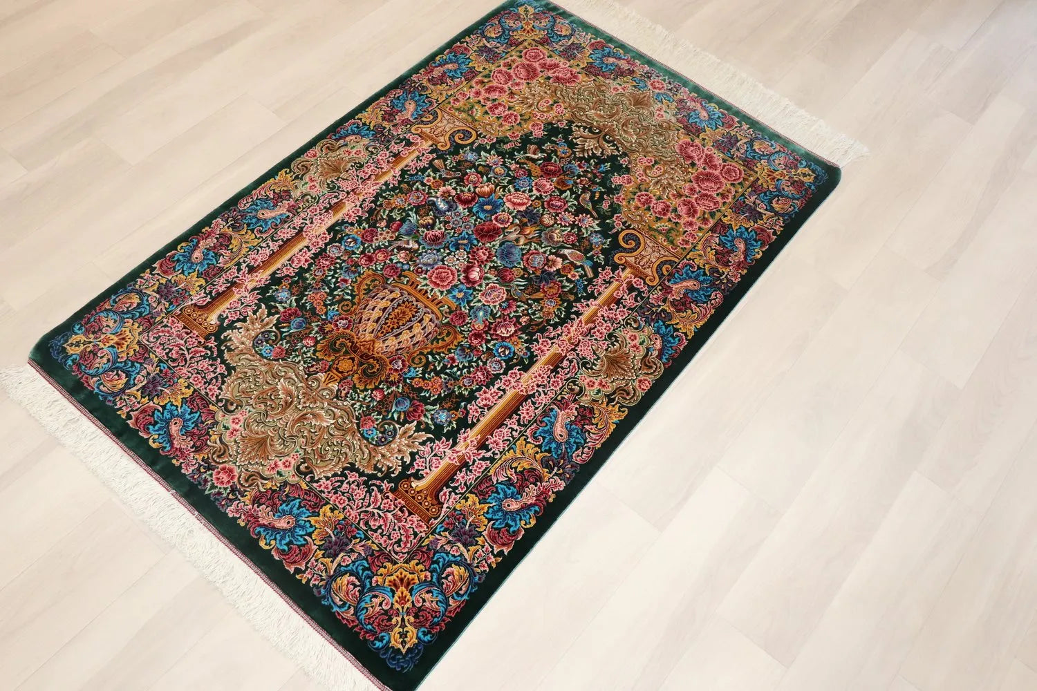 Persian carpet, 100% silk from Qom, Mirmekhidi Atelier, a vase pattern with gorgeous deep green and pink colors
