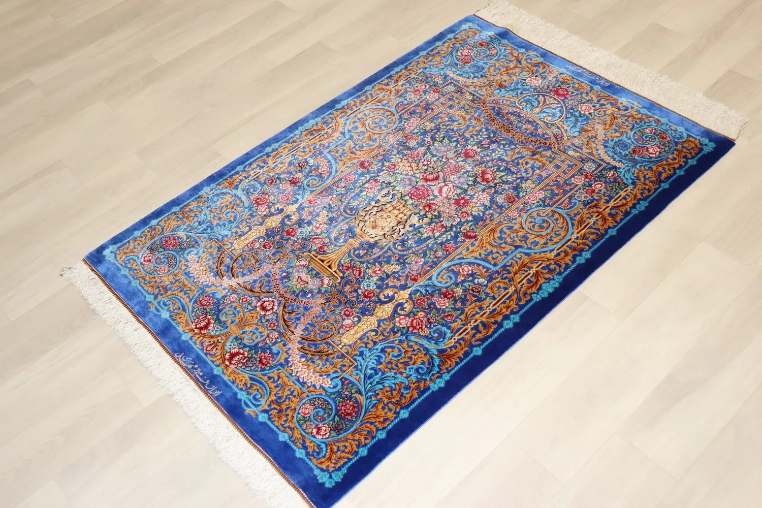 Persian carpet, 100% silk from Qom, Mirmehidi Atelier, the vibrant royal blue and flowers combine beautifully.
