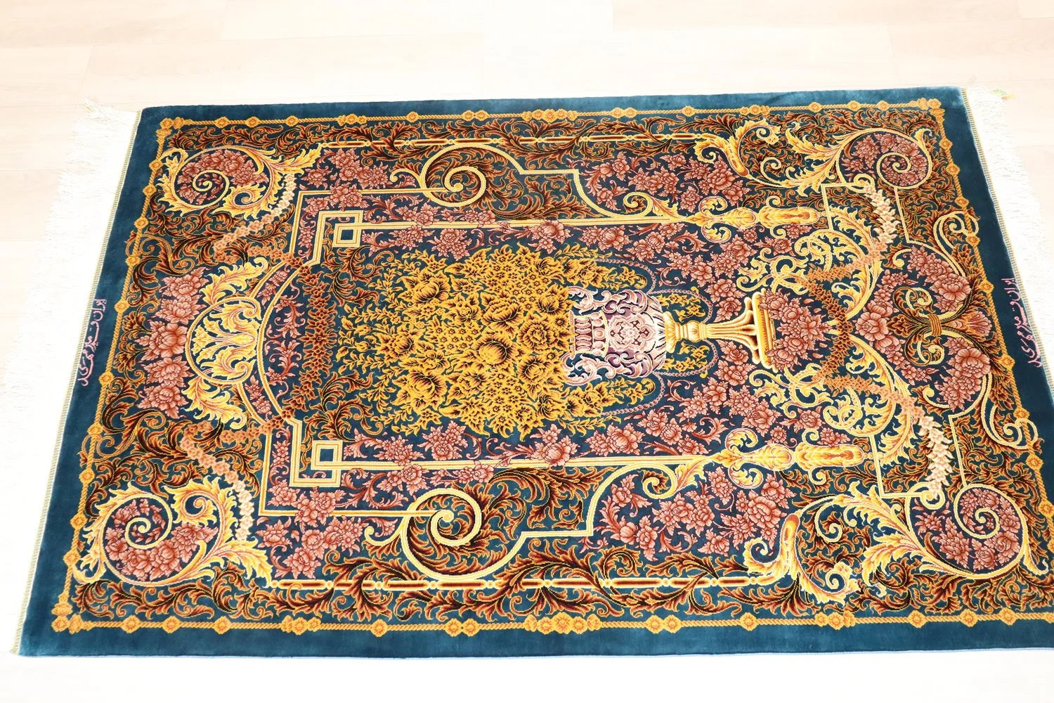 Persian carpet from Qom, 100% silk, Mirmehidi Atelier, the vase pattern and the blue-green color have a beautiful contrast