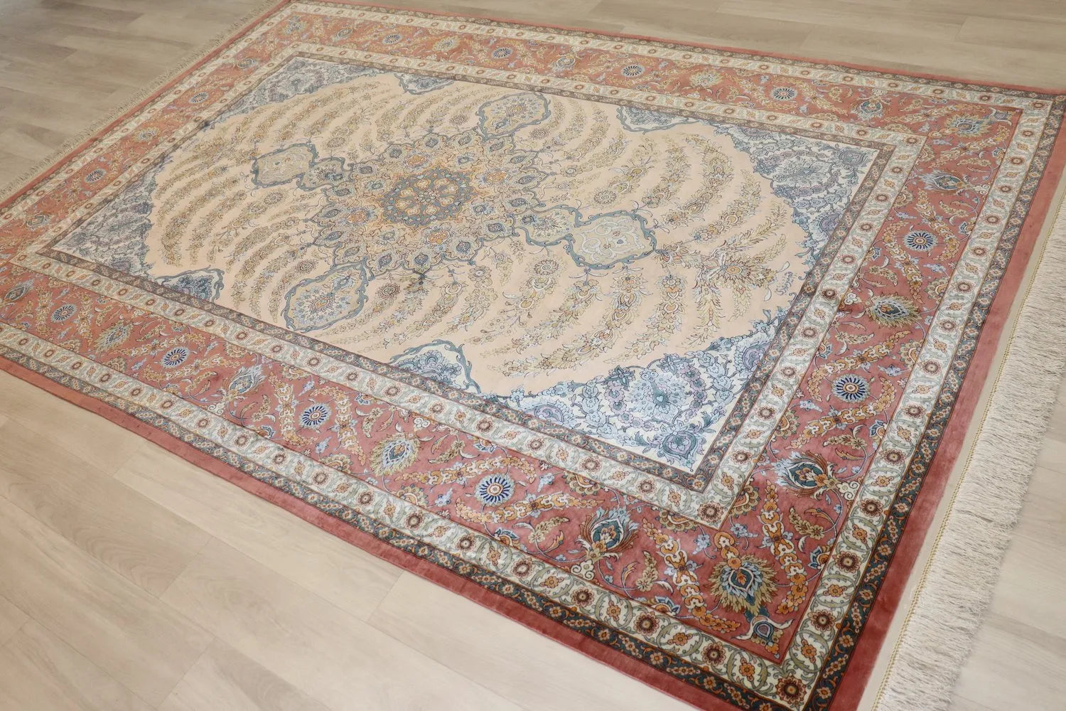 Persian carpet, 100% silk from Qom, Mirmekhidi atelier, a traditional medallion pattern and gorgeous red border.