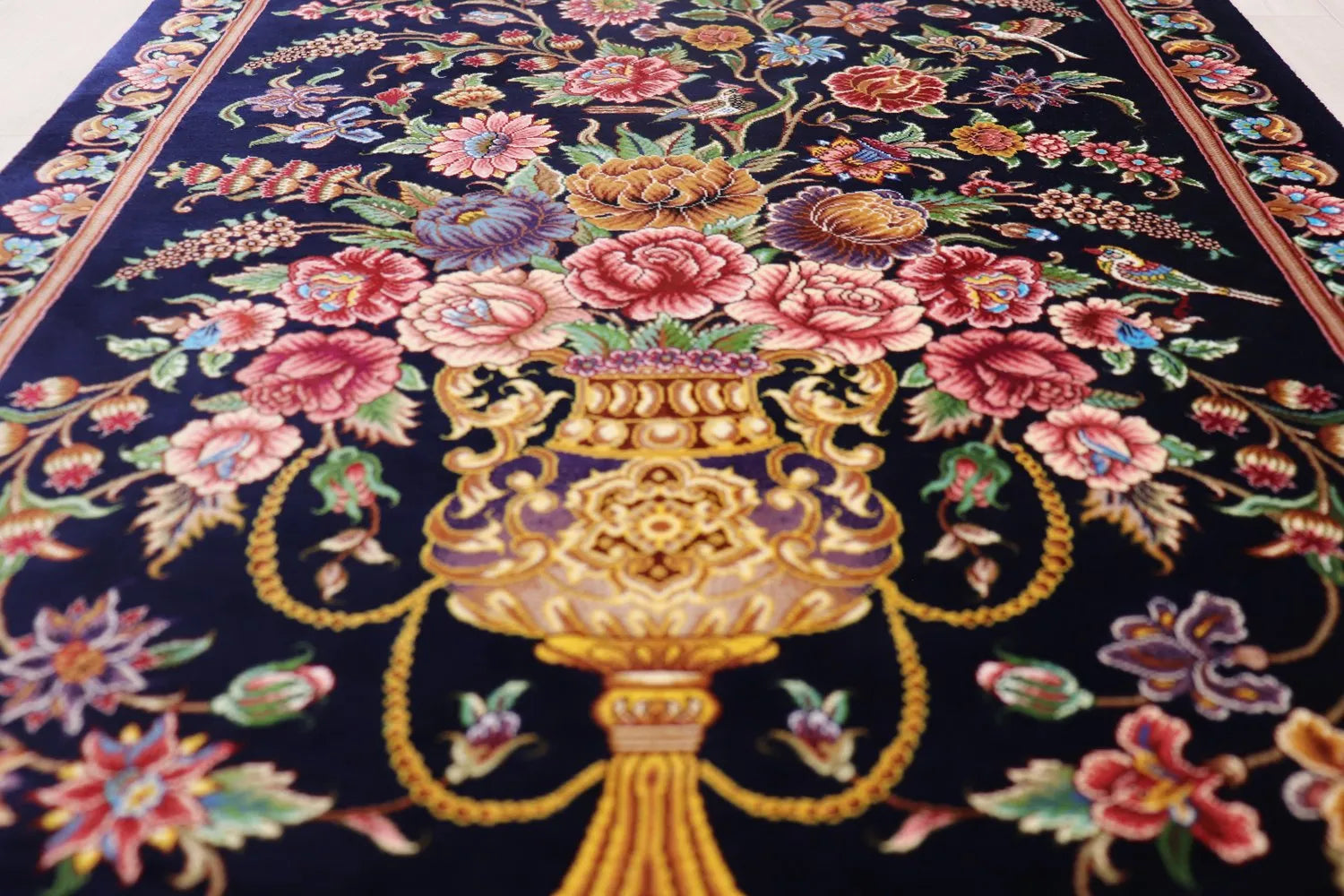 Persian carpet from Qom, 100% silk, Mirmekhidi Atelier, navy blue with a vase pattern and elegant colors