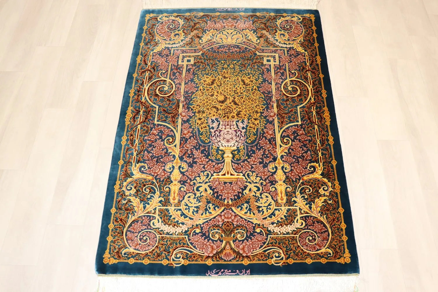 Persian carpet from Qom, 100% silk, Mirmehidi Atelier, the vase pattern and the blue-green color have a beautiful contrast